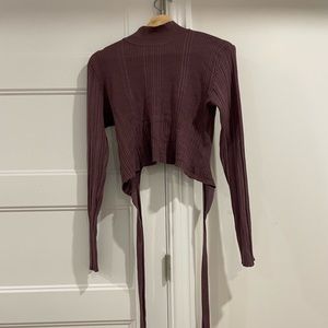 Open back purple turtleneck